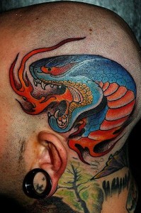 dana helmuth snake head tattoo